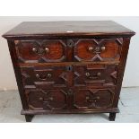 A Jacobean oak chest of 3 graduated drawers with geometric panels,
