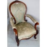 A Victorian mahogany spoonback gentlemans armchair,