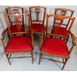 Five Edwardian chairs to include 2 carvers upholstered in a deep red material,