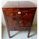 A Georgian mahogany gentlemans wash stand with lift up top over a cupboard and drawers, a/f,