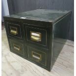 A small vintage metal nest of four drawers,