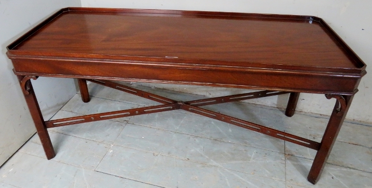 A 20th century Chippendale style mahogany tray top rectangular coffee table in clean condition,