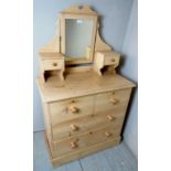 A Victorian pine dressing table with central mirror and 2 small drawers over 2+2 drawers over,