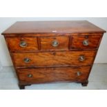 A George III mahogany chest of 3 short drawers over 2 graduated drawers with brass handles,