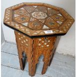 Moorish inlaid sewing table c1900 with mother of pearl and marquetry work and a lift up lid with