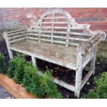 A two seater Lutyen's style garden bench,