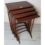 A nest of four tables c1900 in mahogany and in good condition,