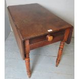 19th century drop leaf mahogany Pembroke table with end drawer over turned legs,
