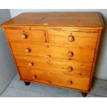 A Victorian pine chest of 2 short over 3 long drawers with turned handles and in very clean