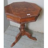 Victorian style mahogany trumpet games table with chess board top and fitted compartments inside,