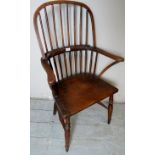 19th century Windsor stick back fireside chair, half hoop and an elm seat,