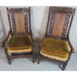 A matched near pair antique Carolean style caned and carved open-sided armchairs,