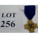 A German 40 years service cross on blue