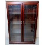 A 20th century mahogany display cabinet