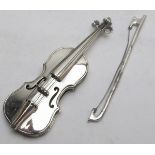 A miniature violin and bow, marked 925,