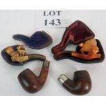 A carved Meerschaum pipe in the form of