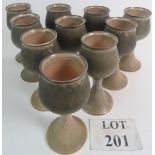 A set of ten studio pottery goblets by I