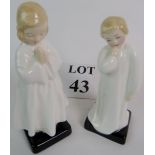 A matched pair of Royal Doulton figures,