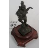 An antique Indian cast bronze figure of