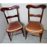 A pair of Edwardian carved bedroom chair