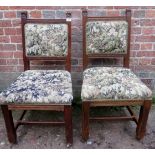 A pair of Gothic-revival oak framed dini