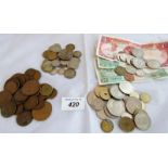 A collection of early to mid 20th Century UK coins including 2 x 3d silver coins,