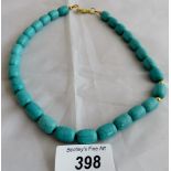 Turquoise Howlite gemstone necklace. 18" length. (15mm barrel beads).