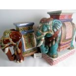 Two Chinese ceramic garden seats modelled as elephants, one brown, the other green,