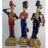 Three Capodimonte porcelain figures modelled as soldiers of the 1820's-40's period,