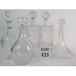 A pair of lead crystal spirit decanters with stoppers, a ship's decanter and stopper,