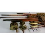 Two antique/vintage brass fishing reels, and three vintage fishing rods in canvas cases.