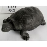 A tortoise (or turtle) inkwell, cast metal with two ceramic ink pots under the shell lid.