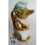 A 19th century French Faience jug in the form of a pig by the Onnaing Factory, 26cm tall.