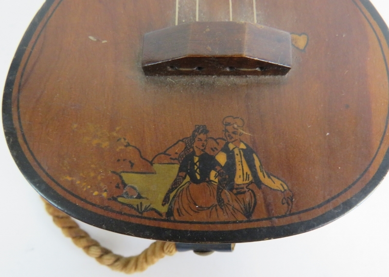 A Spanish guitar with inlaid decoration, early 20th century, fitted with a musical box, hinged lid, - Image 5 of 11