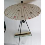 A 1960's oriental table lamp with leg extensions to make it a floor lamp, working order,