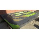 A very large diorama for Scaletrix race track set up, comprising three tables,