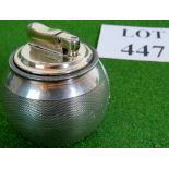 A silver table lighter, hallmarked London 1962/3, silver content weighs 165 grams,