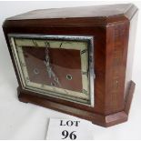 A mantel clock with square dial and Roman numerals, 9 bar chime, dial marked Whitt West, 32cm wide,