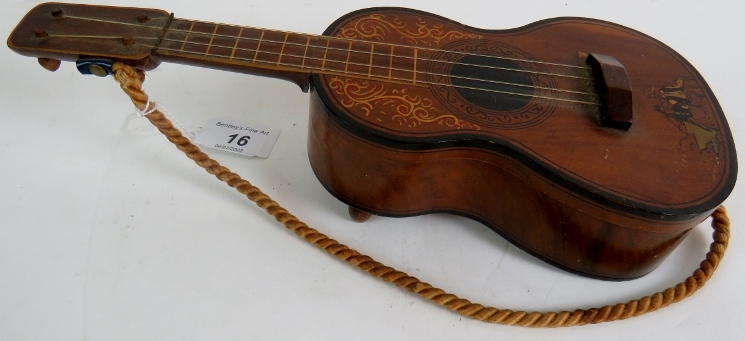 A Spanish guitar with inlaid decoration, early 20th century, fitted with a musical box, hinged lid, - Image 2 of 11