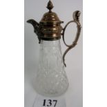 A good quality late 19th / early 20th century silver plated mounted glass claret jug, 30cm high.