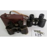Two pairs of vintage Carl Zeiss `Jena' binoculars (one cased), and a military whistle.