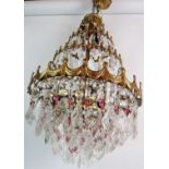 A fine quality period style four tier gilt-metal and cut glass lustre drop chandelier, 2' 2" drop.