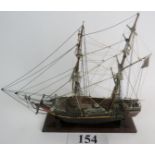 A scratch built model of a whaling ship, with detailed (and we are told) correct rigging,