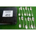 A set of 12 teaspoons in a case, hallmarked Sheffield 1957, weight 163 grams,