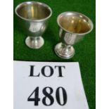 Two silver egg cups, 65.4 grams, 58mm tall.