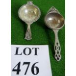 Two silver tea strainers, 93.2 grams, 15cm long and 12.5cm long.