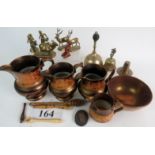 A selection of copper and brass lustre ware jugs,