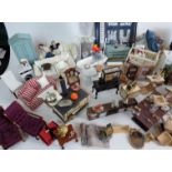 A collection of various items of dolls' house items to include armchairs, desk, refrigerator,