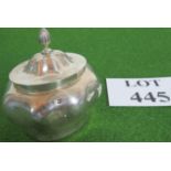 A silver tea caddy hallmarked London 1899-1900 hallmarks rubbed, of an ovoid lobed form,