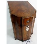 A fine George III shaped front figured mahogany knife box with exotic cross banding,